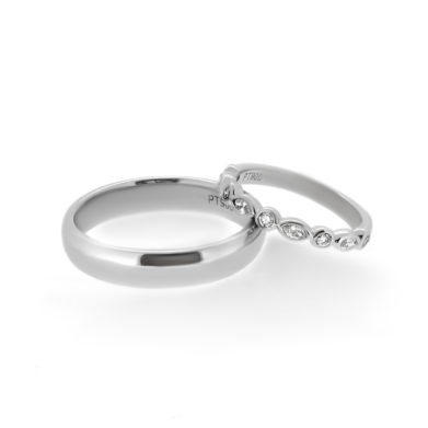 white gold bride and grooms rings